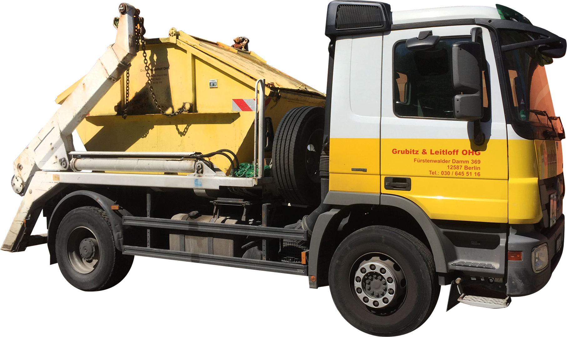 beschrifteter Kipper mit Container der Fahrzeugflotte der Grubitz & Leitloff OHG